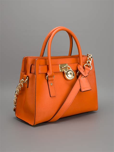 orange camouflage michael kors purse|Michael Kors orange bag.